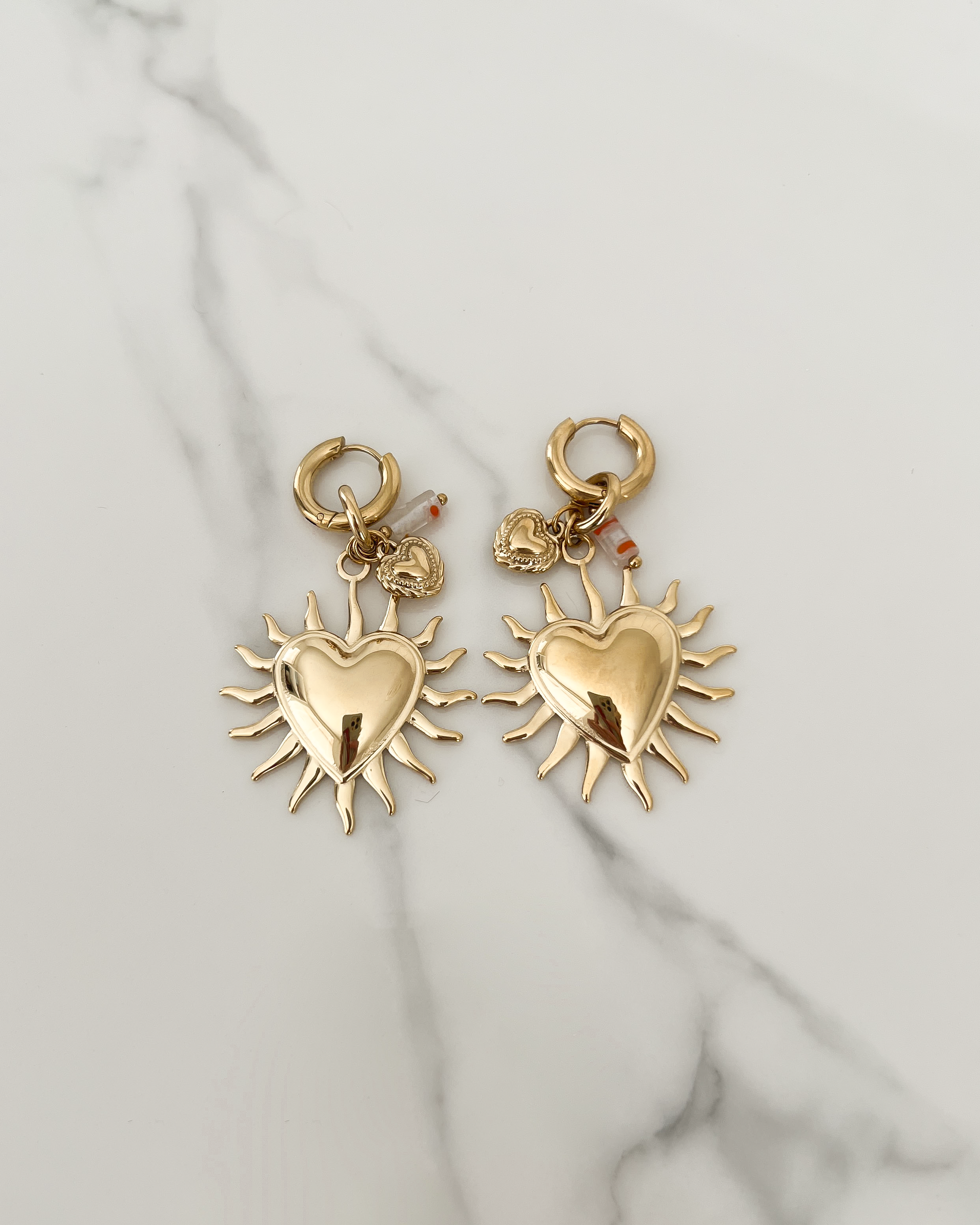 Radiant Heart Earrings in Gold
